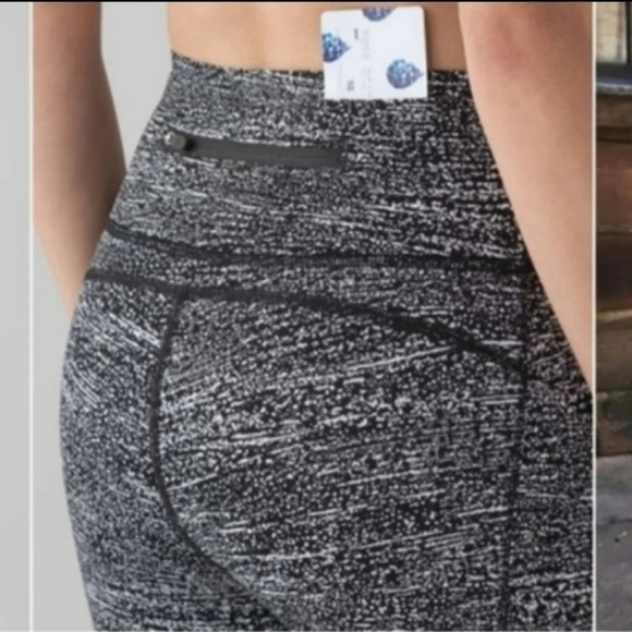 Lululemon Pace Perfect 25" Leggings with Mesh Cutouts in Air Time White Black 10 - Picture 11 of 16
